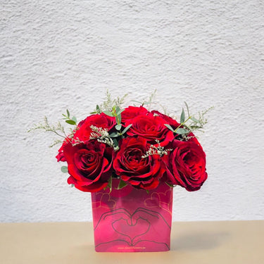 Red Roses & Limonium in Glass Vase
